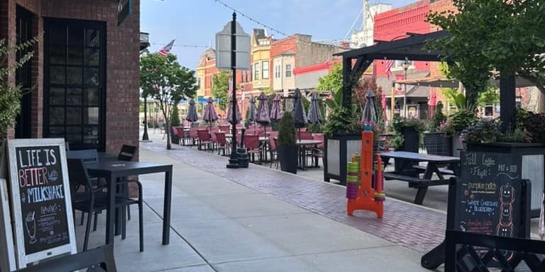 Early morning in downtown North Utica, outdoor seating.